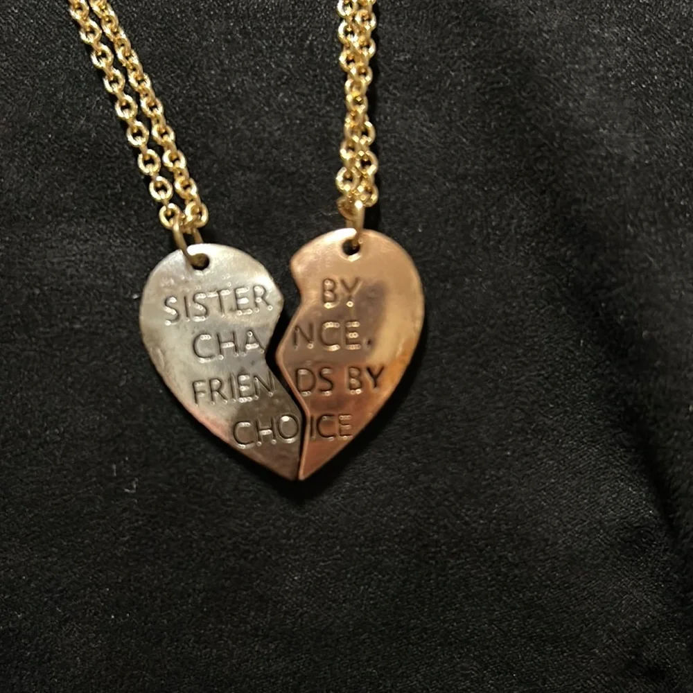 Kids two 18” sisters heart gold colored necklace with a 1” extender. Gently used